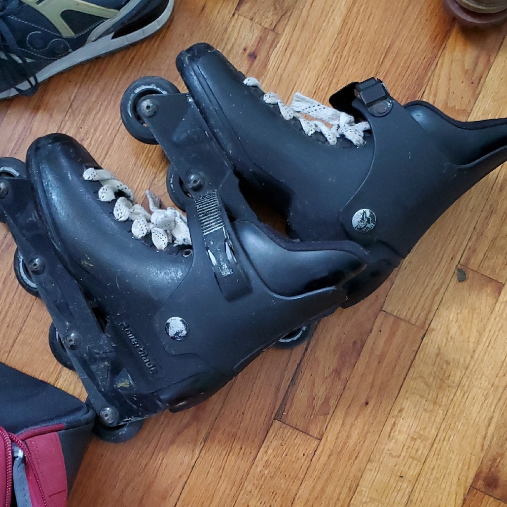 Black Rollerblades Hockey Style with White Laces